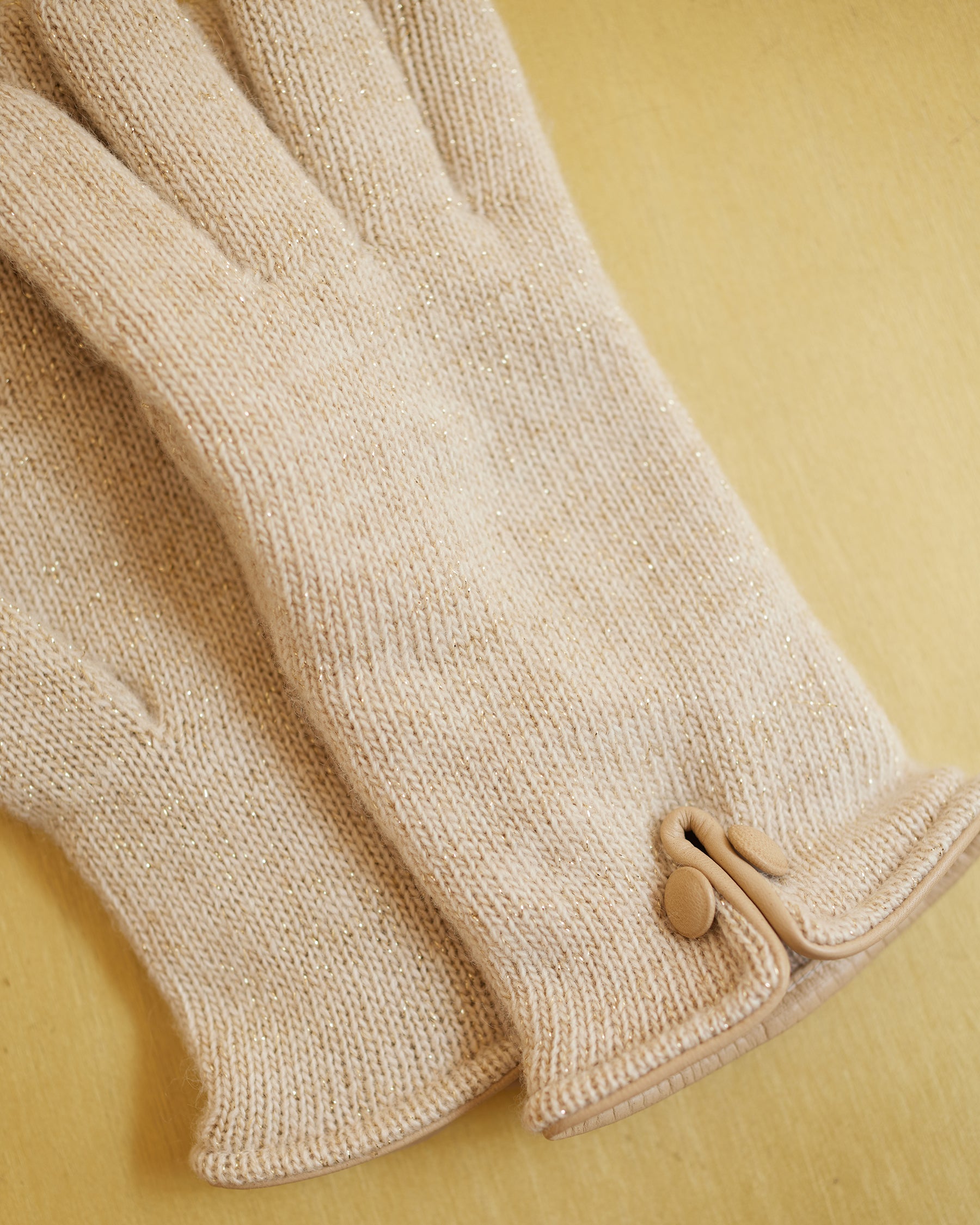 Ella Cashmere Blend Gloves in Gold Shimmer Sand-detail of the leather trim and gold shimmer