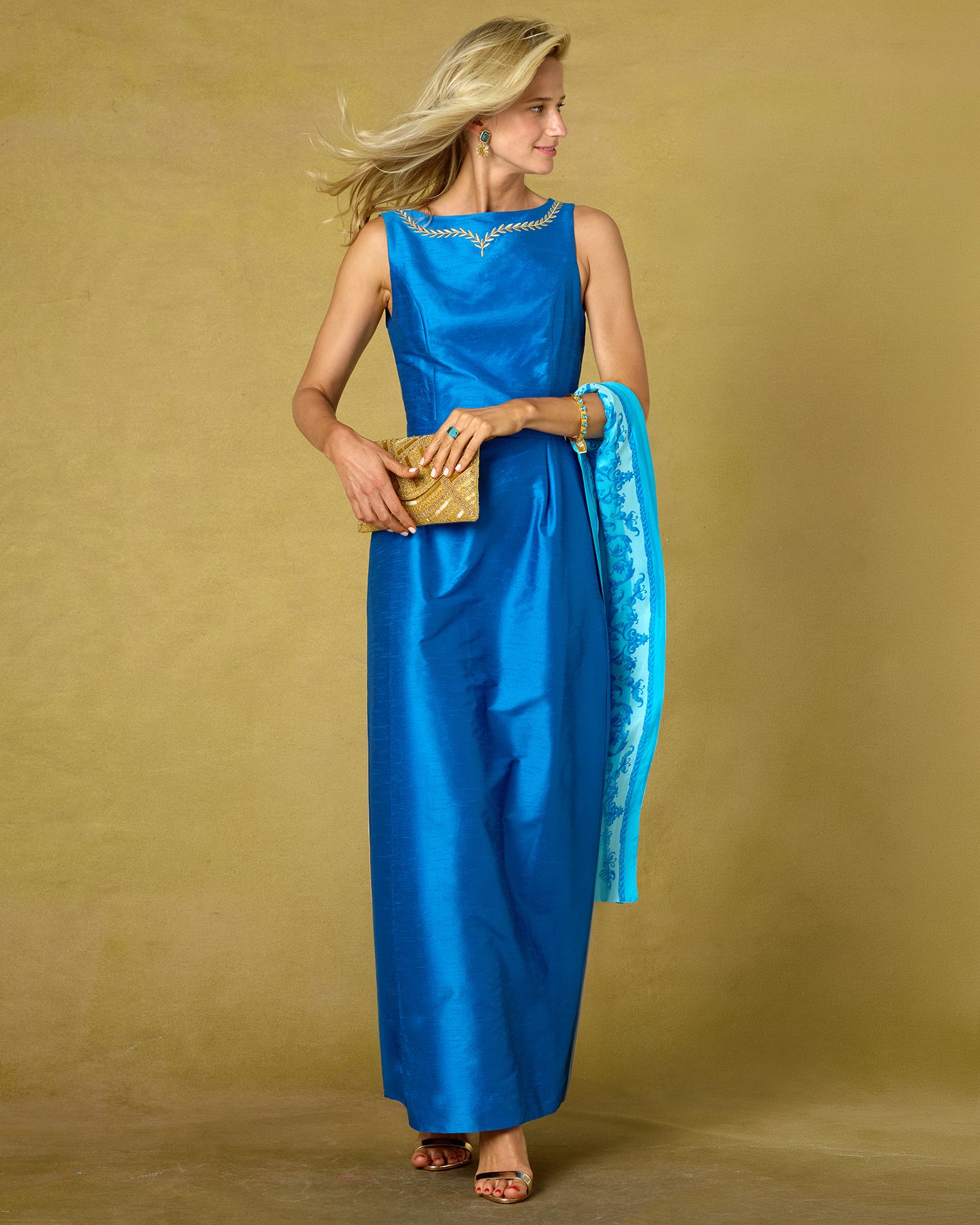 The Cassidy Silk Shawl in Rococo Blues worn with the Lauria Gown in Royal Blue and Gold Embellishment