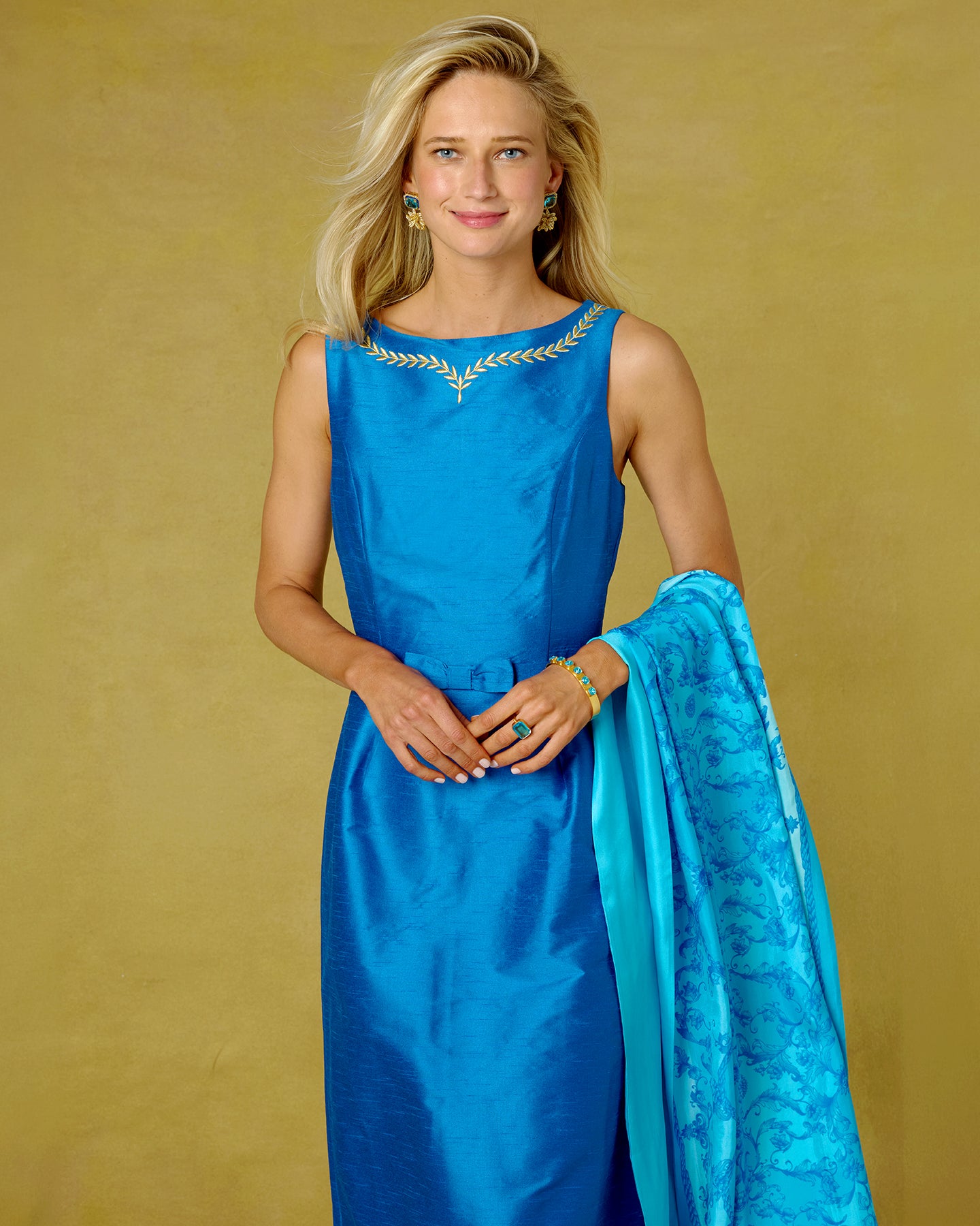 The Cassidy Silk Shawl in Rococo Blues worn with the Lauria Gown in Royal Blue and Gold Embellishment