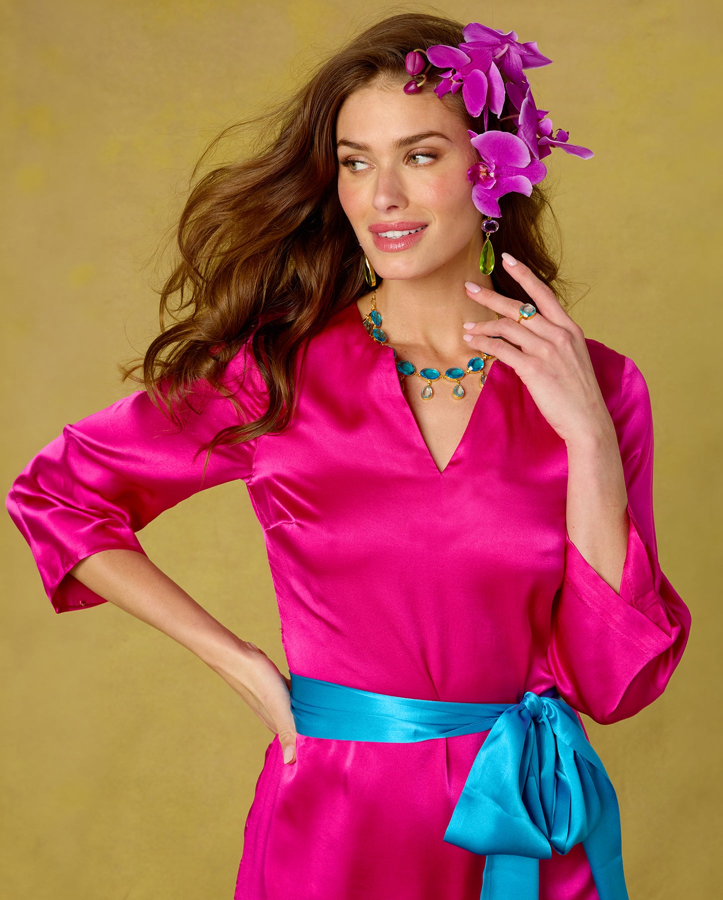 The Ravenna Statement Drop Earrings in Jewel Tones worn with teh Majorella Silk Dress