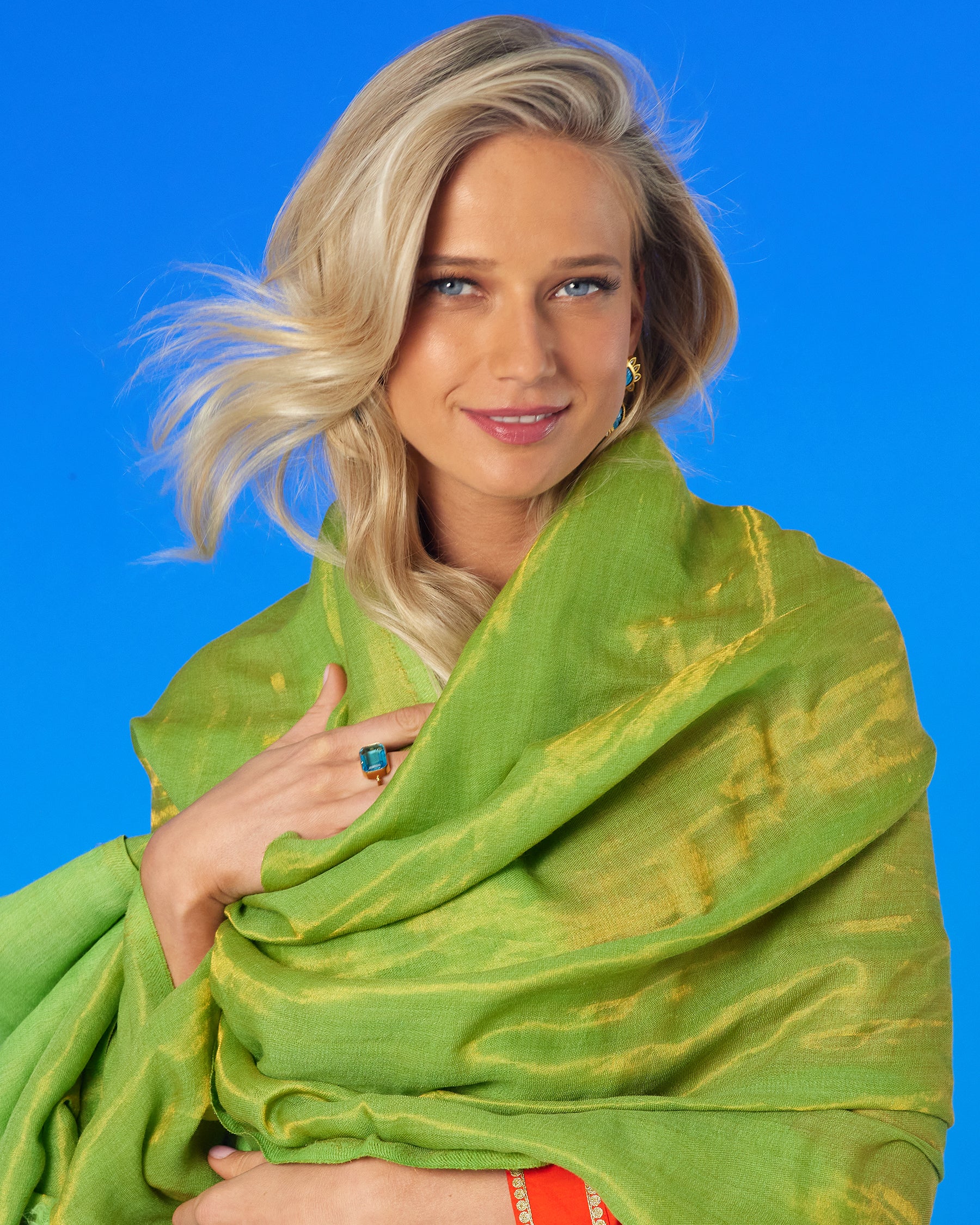 Josephine Reversible Pashmina Shawl in Gold Shimmer Lime wrapped in a cocoon to show how soft it is