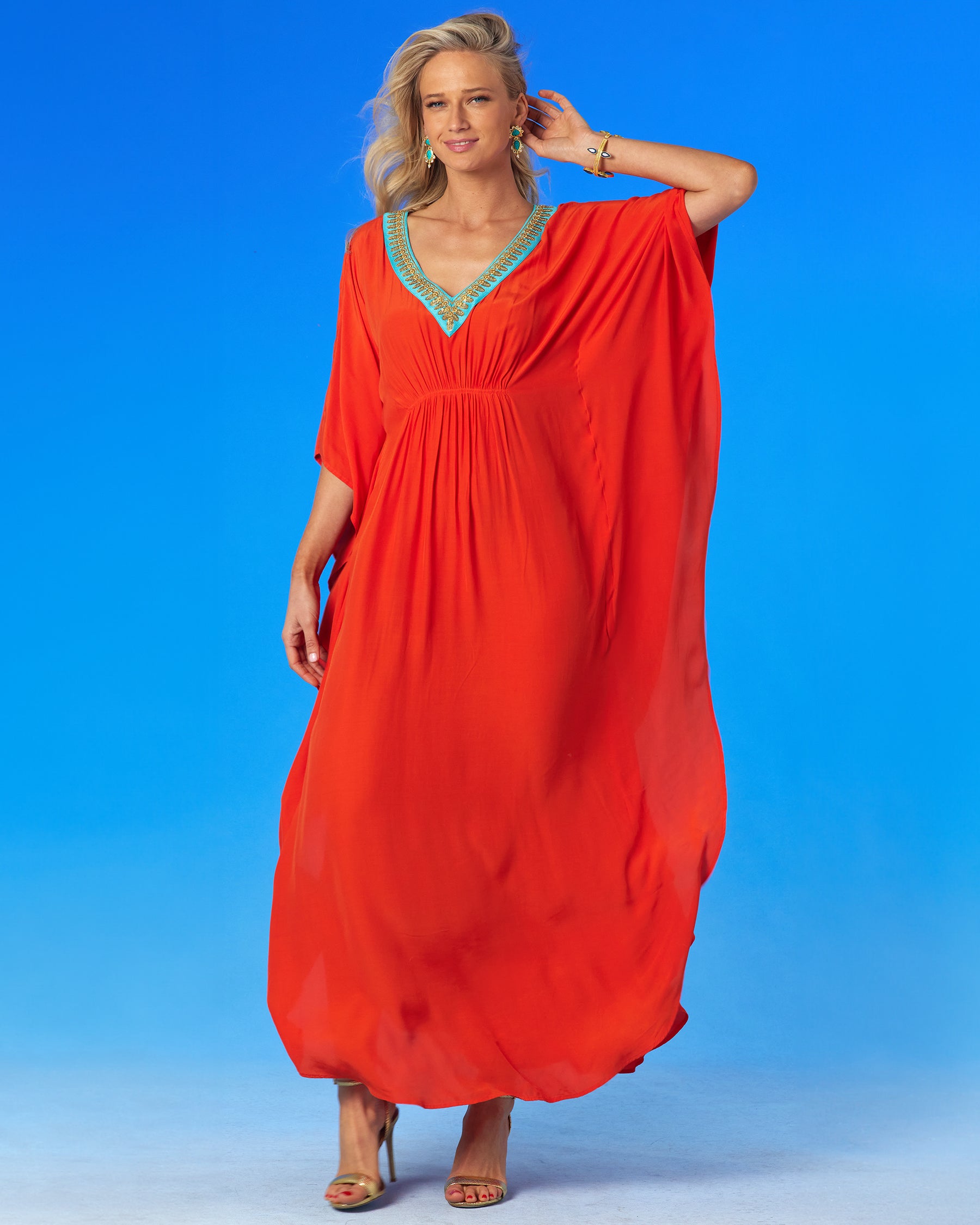 Olympias Cinched Long Kaftan and Neoclassical Embellishment-With one arm up