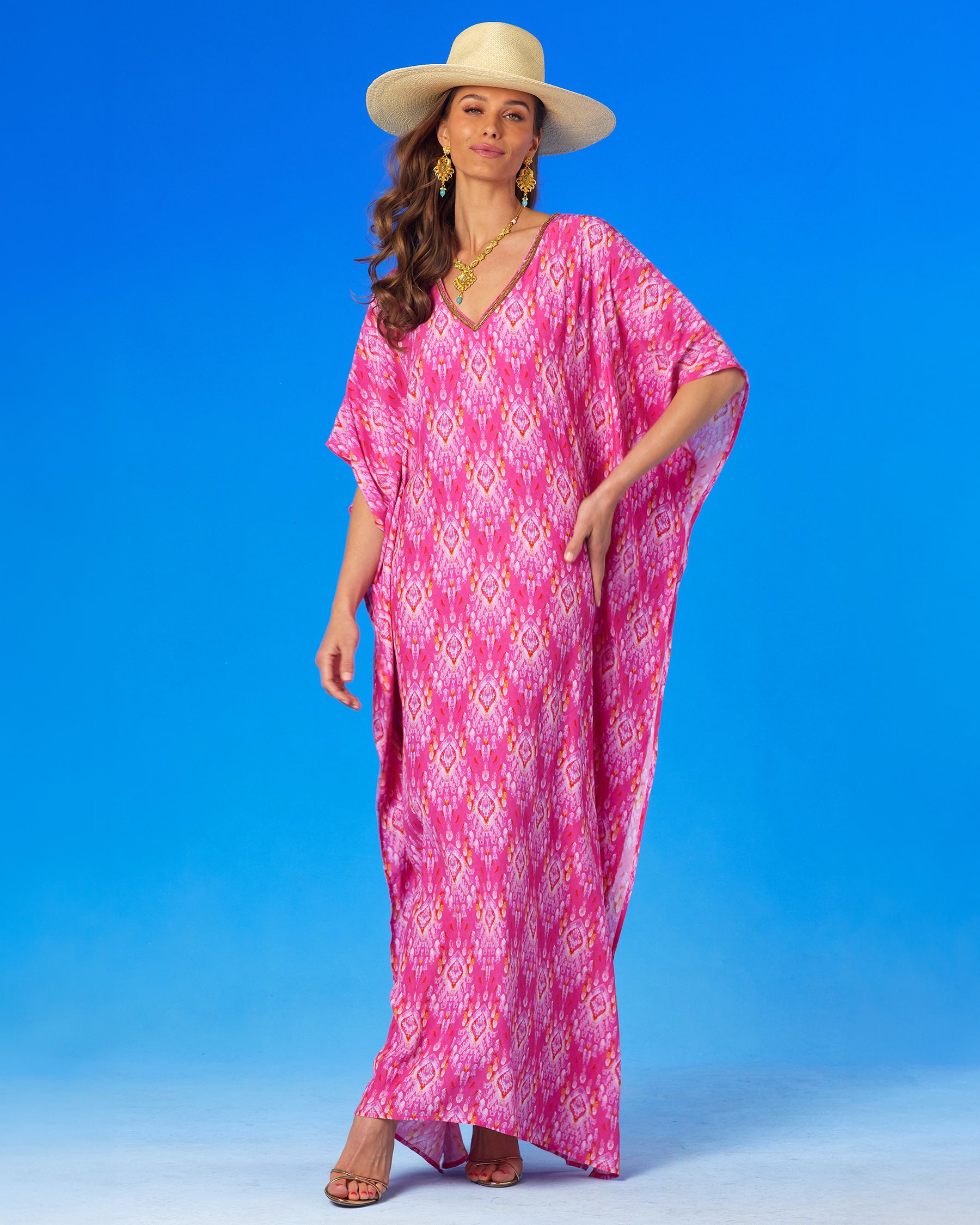 Orchidea Kaftan in Fuchsia Pink Ikat and Gold Beaded Trim-Hand on hips