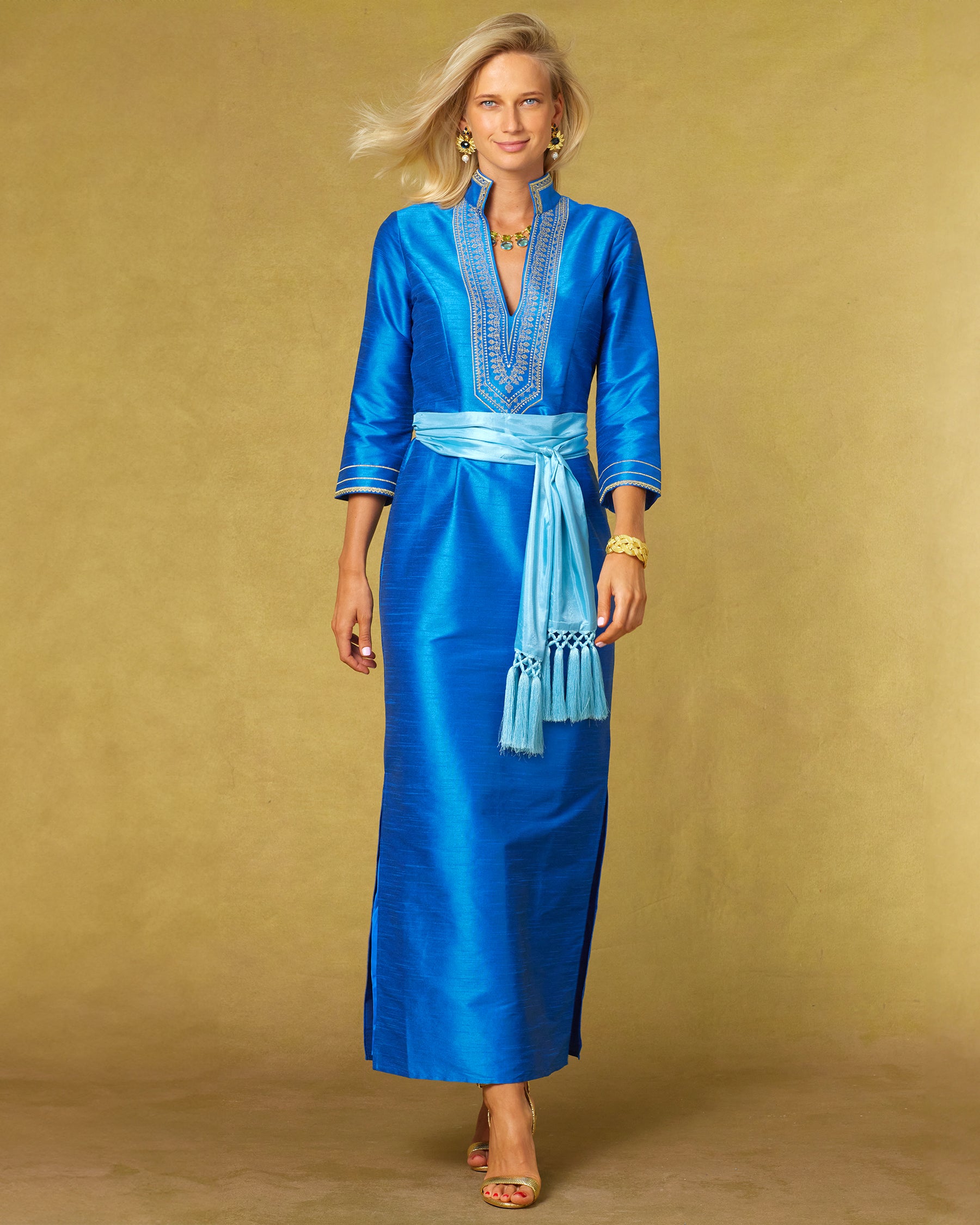 Regine Long Tunic Dress in Royal Blue and Gold Embroidery with the waist cinched with the Cosima Turquoise Sash Belt-Front View