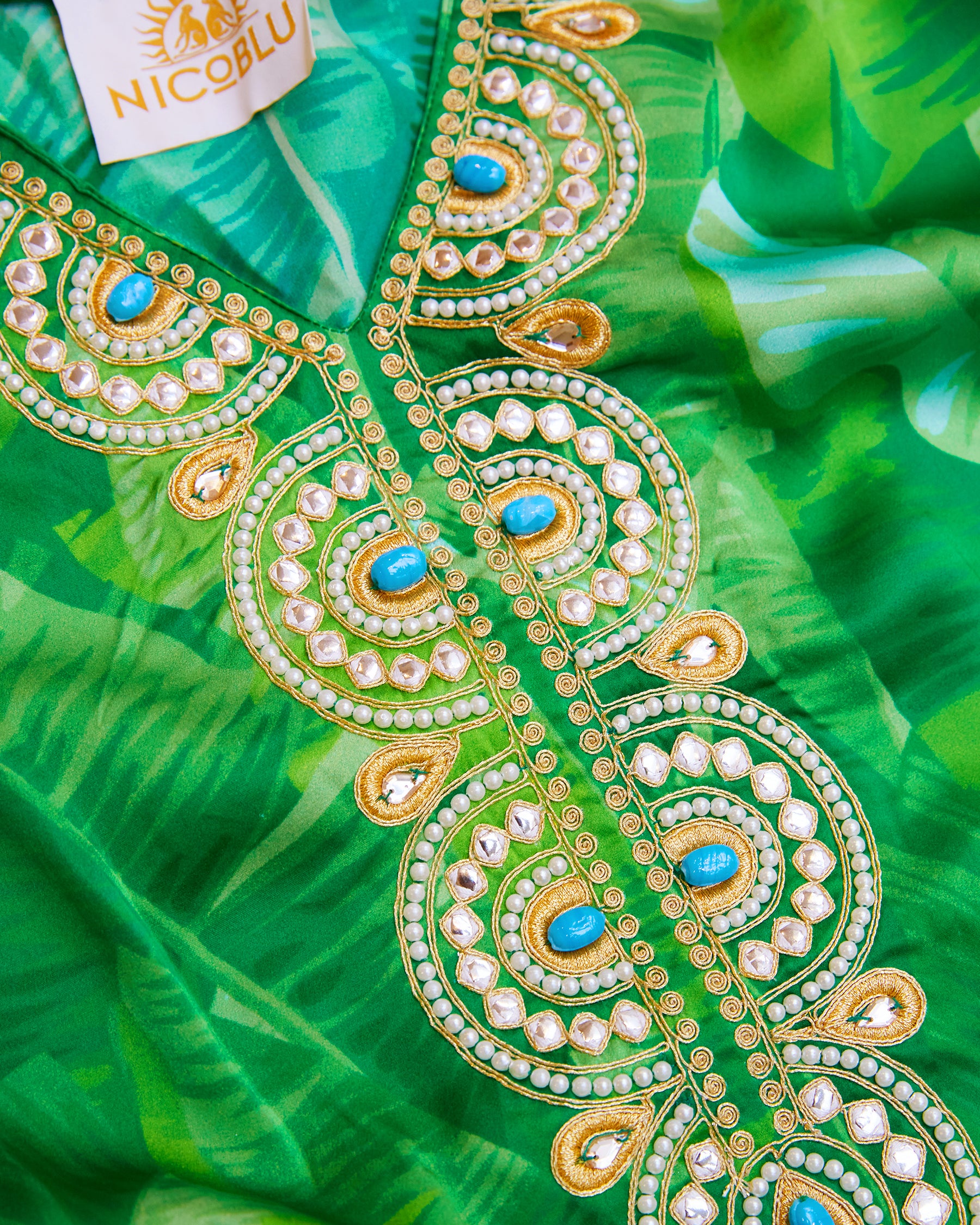Schuyler Silk Kaftan in Palms and Gold Embellishment-Detail of embellished neckline