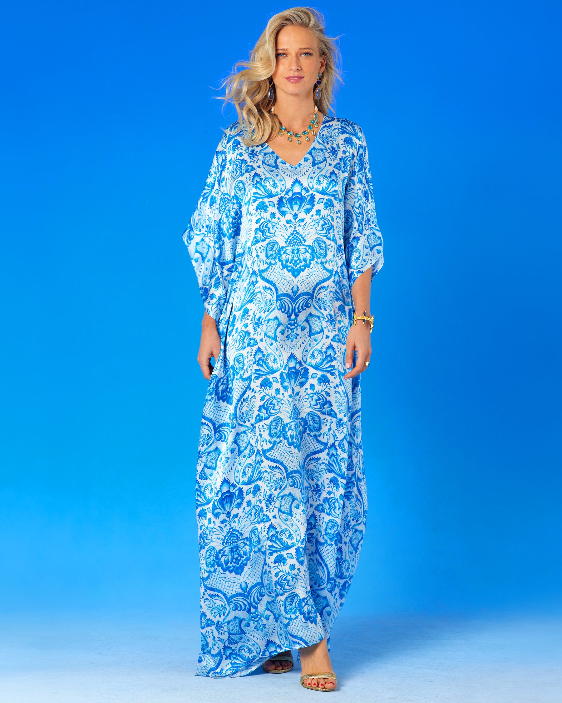 Woman wearing Shalimar Silk Kaftan in Blue and White-full frontal view