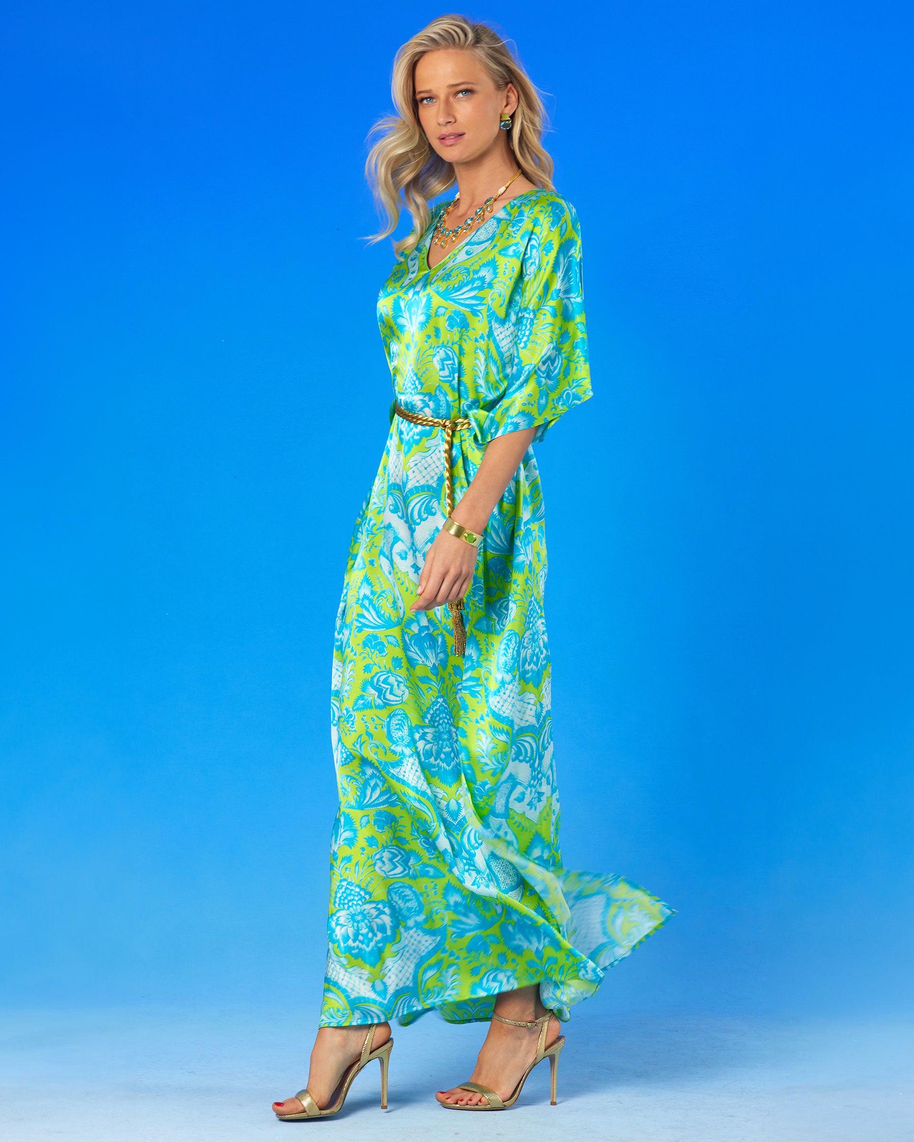Shalimar Silk Kaftan in Turquoise and Lime-Side viewwalking and cinched with the Artemis Gold Rope Belt