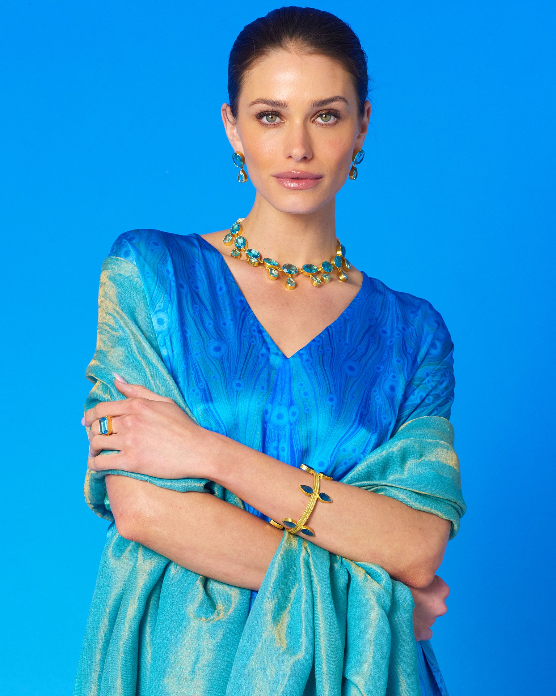 Calliope Long Silk Dress in Sea Nymph Blues with the Josephine Pashmina Shawl in Turquoise Gold Shimmer draped over the shoulders