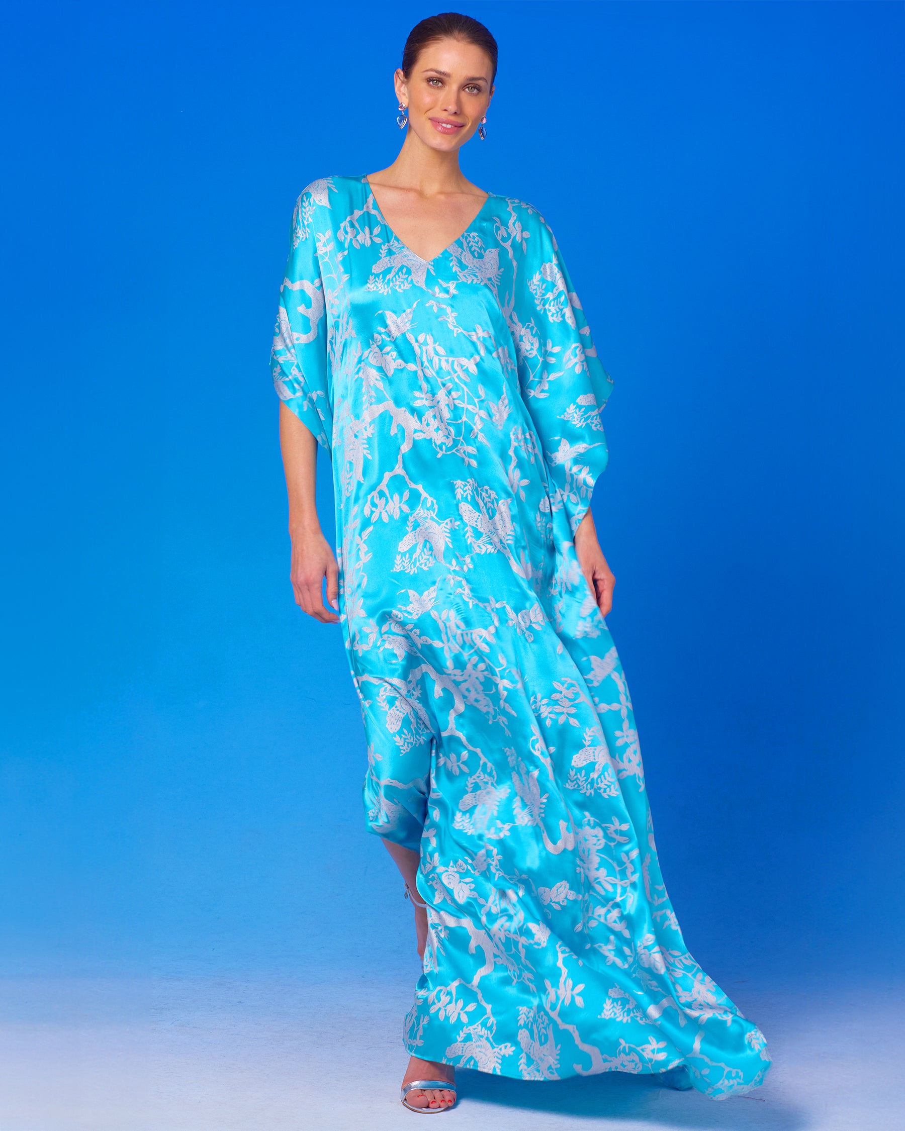 Ava Silk Kaftan in Turquoise and Silver Motif front view walking
