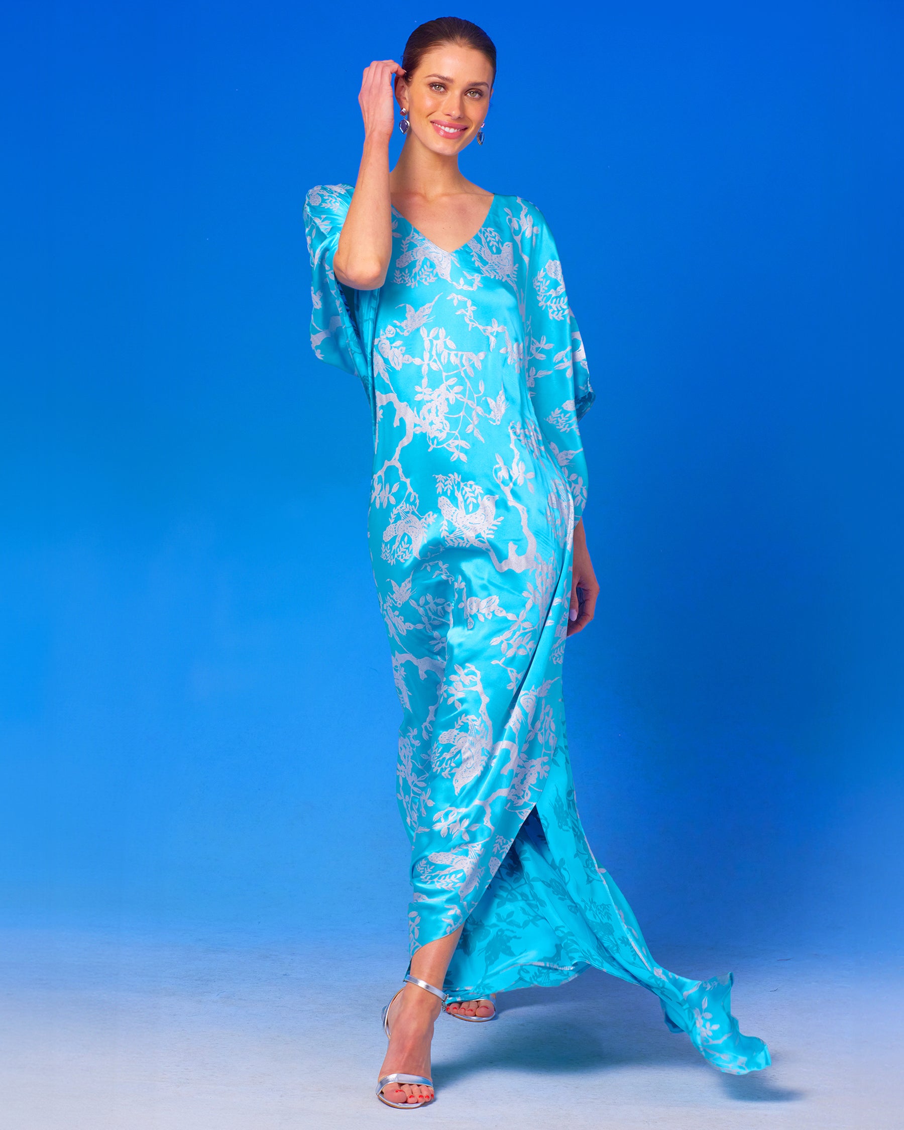 Ava Silk Kaftan in Turquoise and Silver Motif walking front view