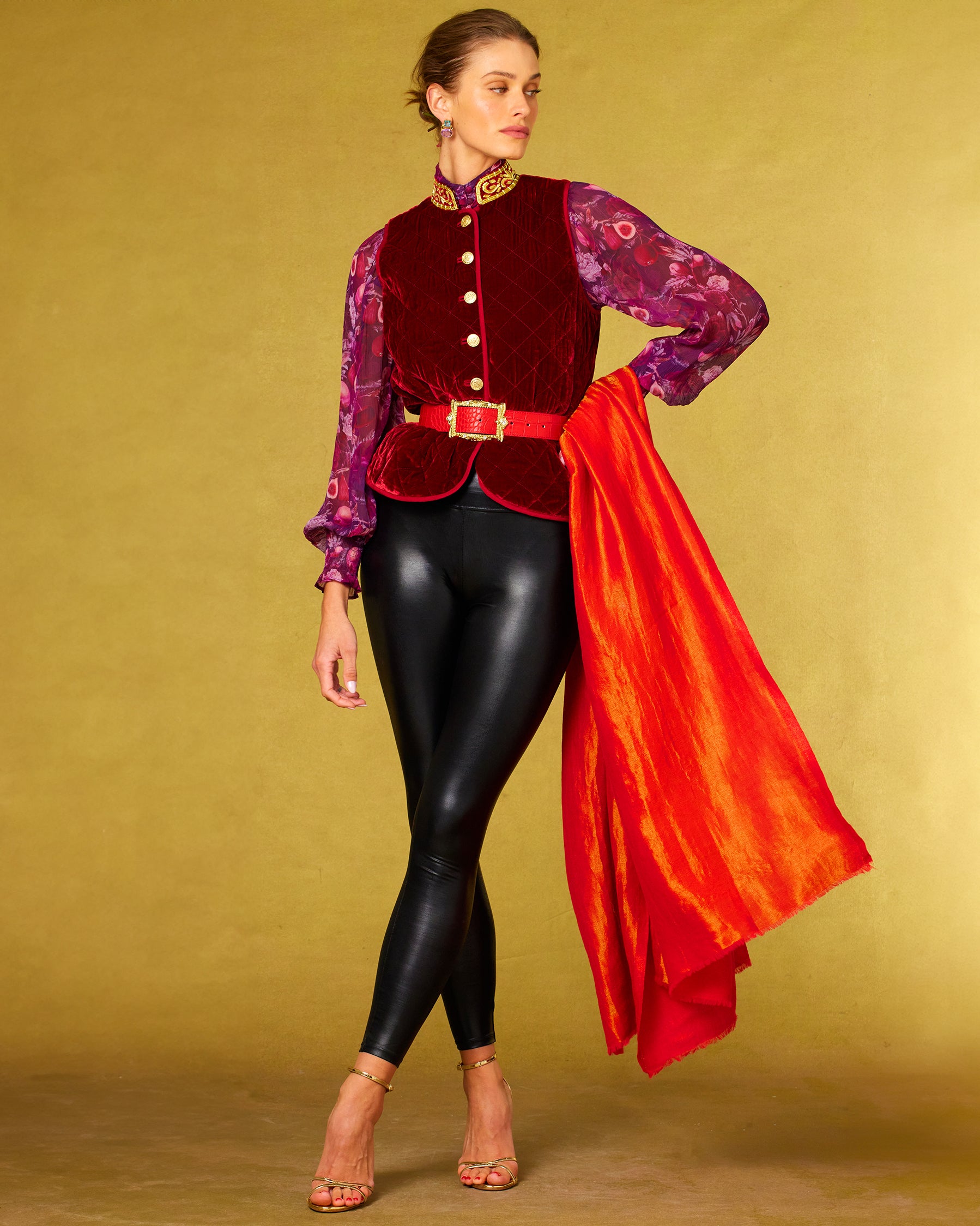 Bentley Quilted Vest in Crimson Red Silk Blend Velvet and Gold Embellishment worn with the Tess Crinkle Chiffon Blouse in Opulent Harvest, the Roxana Black Leggings and the Josephine Reversible Pashmina Shawl in Gold Shimmer Red-Full Length View