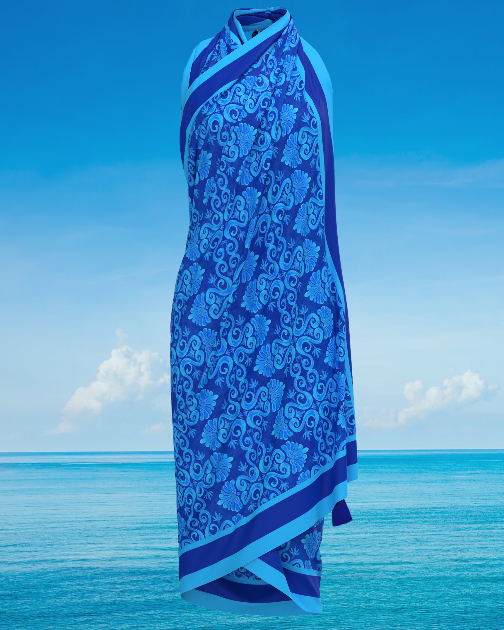 Thetis Organic Cotton Pareo in Mediterranean Blue tied as a halter dress