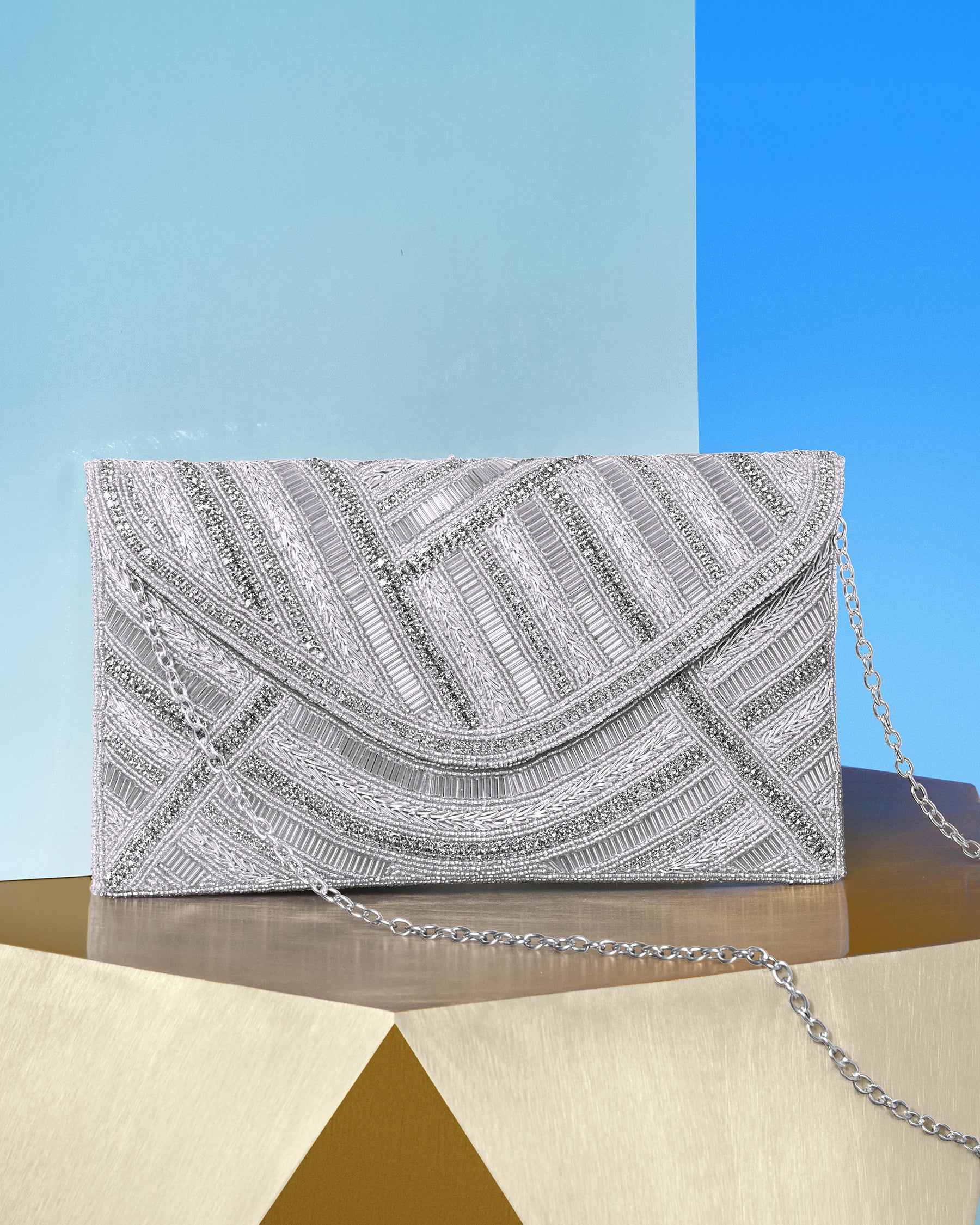 Betty Clutch in Beaded Silver showing chain shoulder strap