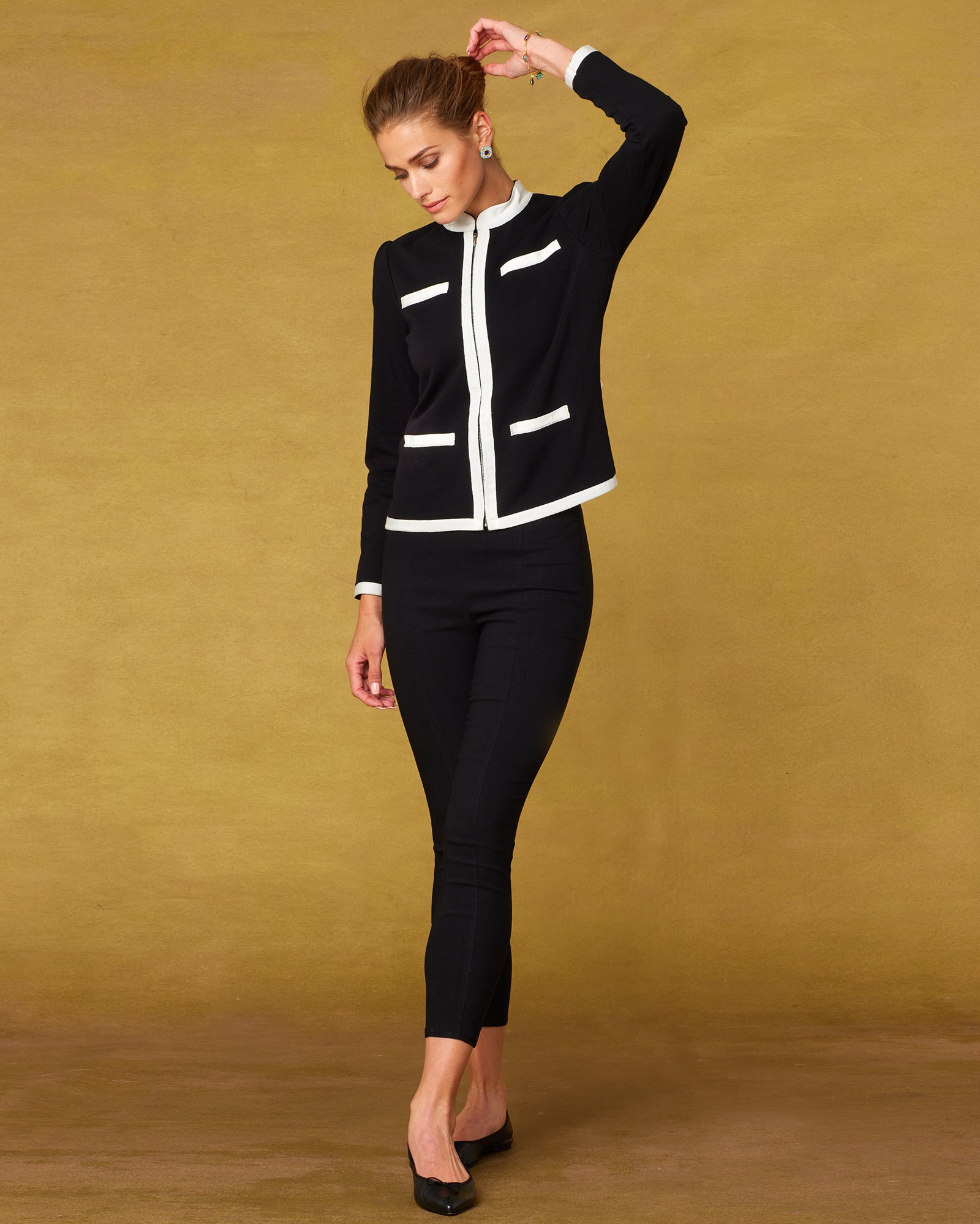 Audrey Zip-Up Jacket in Black Fleece-With Arm Raised Up