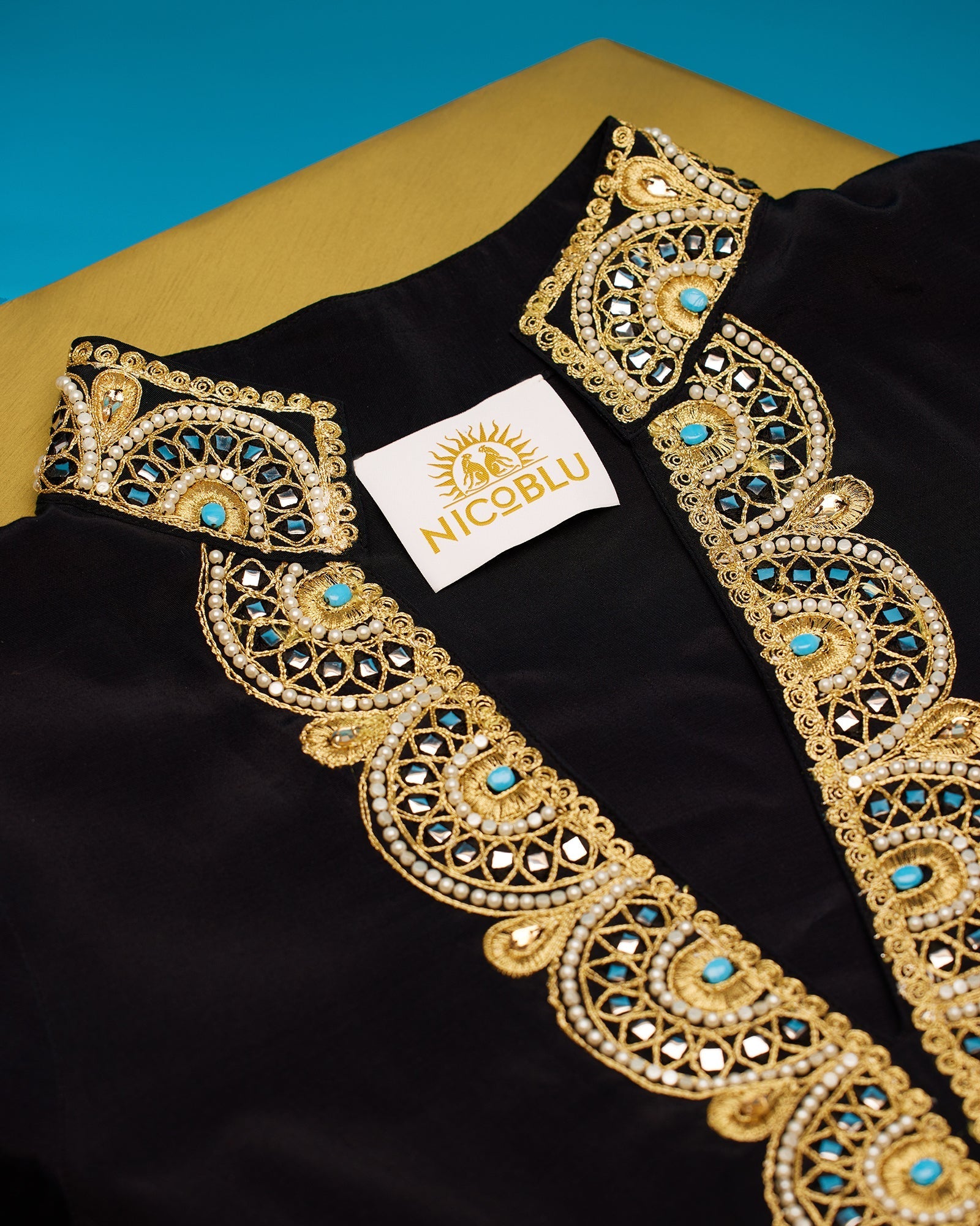 Noor Long Black Tunic Dress with Gold Embellishment-Detail of Neckline Gold and Turquoise Embellishment