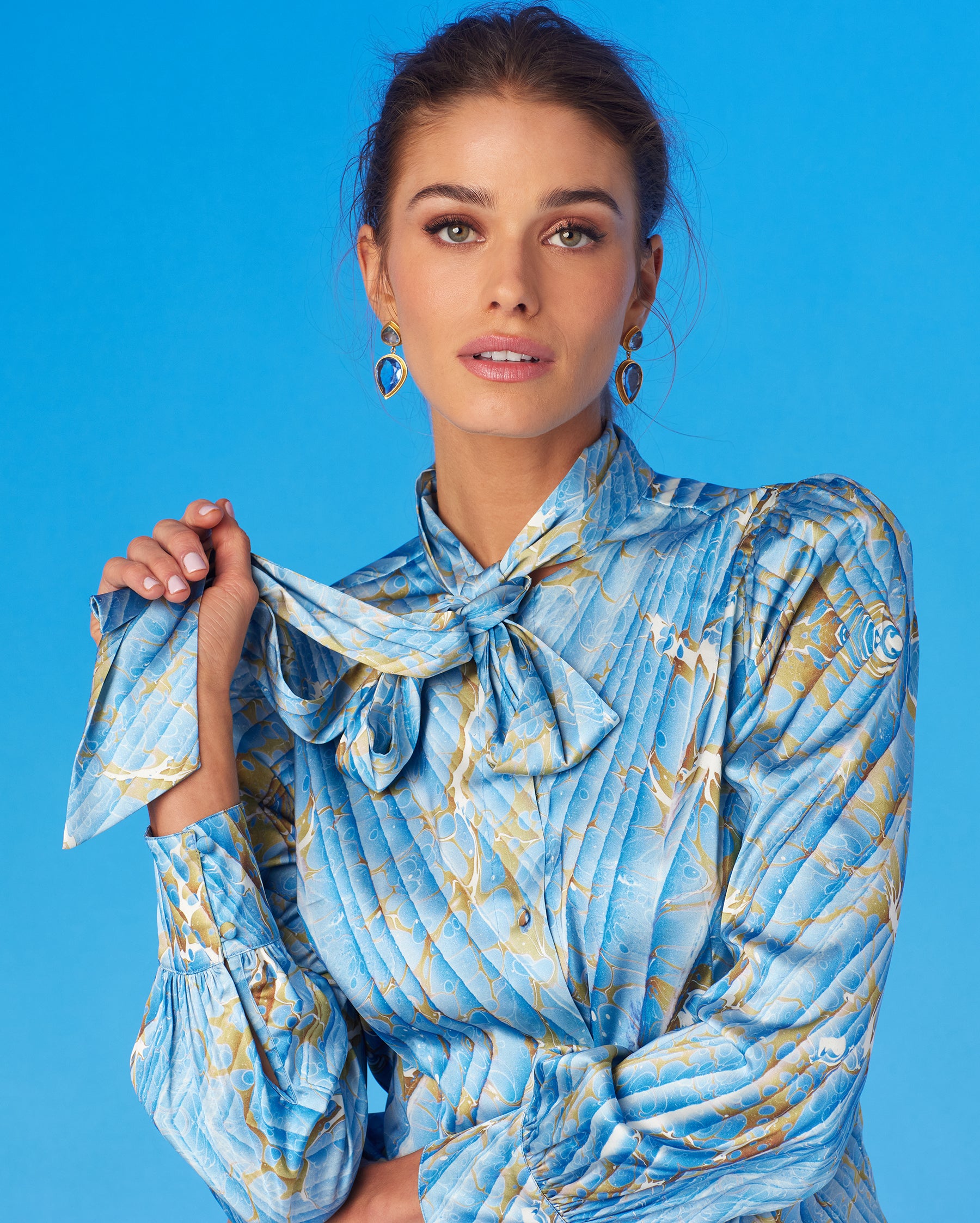 Aurelie Pussybow Blouse in Sky Blue Marble-Holding Bow