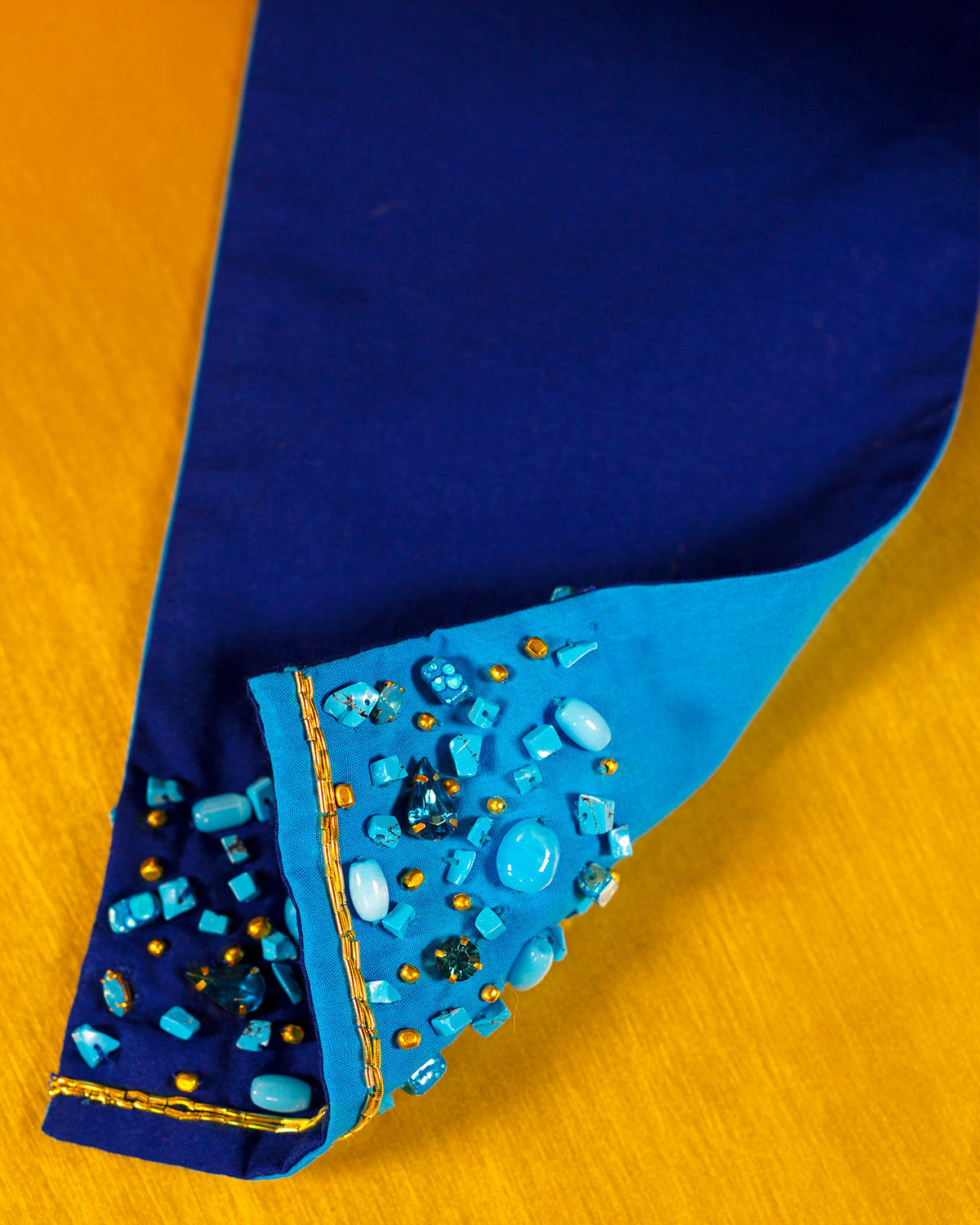 Celeste Reversible Belt in Brilliant Blue Embellished in Gold and Semiprecious Stones-closeup