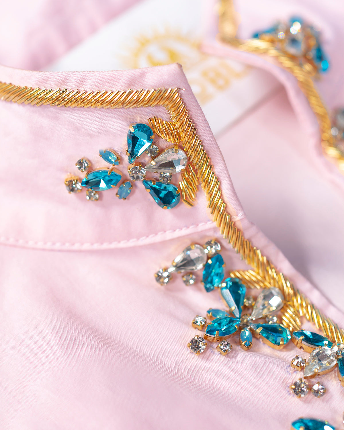 Circe Tunic in Blush Pink with Crystals and Gold Embroidery-Closeup of Crystal Jewel and Zardozi Ambellishment