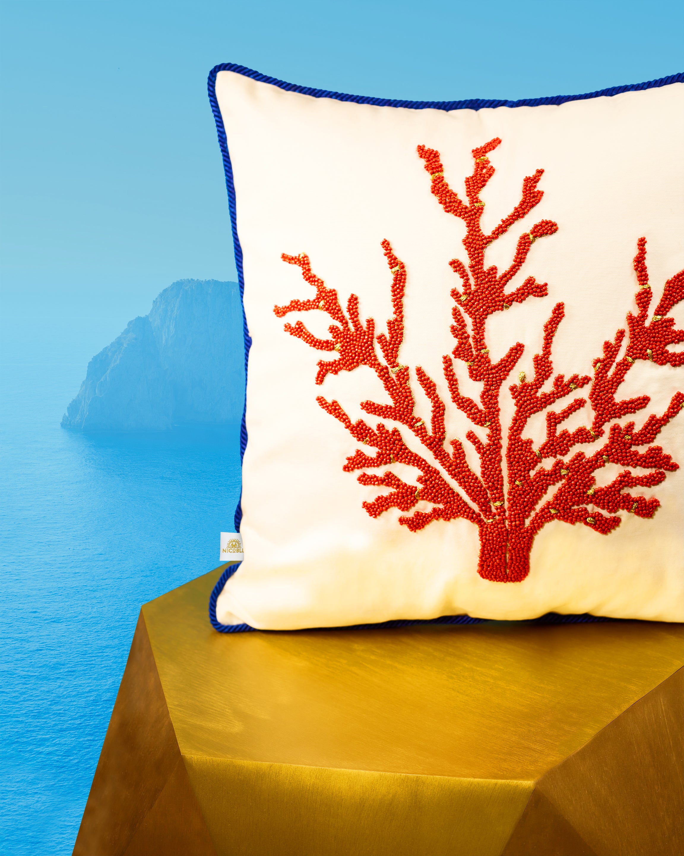 Capri Pillow Embellished in Coral Motif